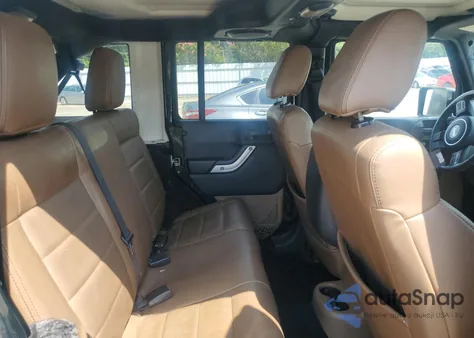 2011 Jeep Wrangler Unlimited Sahara из США, поврежденный, VIN 1J4HA5H13BL619200